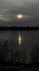 Overcast afternoon documented along Kama River waterfront in Chaikovsky