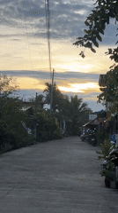 Evening car journey through Davao City residential areas documented