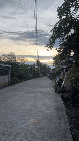 Evening car journey through Davao City residential areas documented