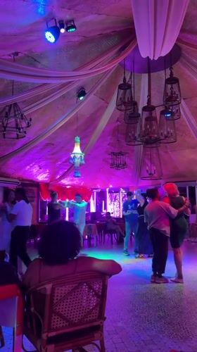 Couples dance salsa at decorated Pattaya venue Saturday evening