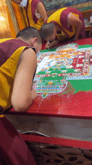 Masked monks create sand mandala at Dharamshala monastery