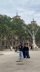 Routine tourist activity documented around Barcelona's Arc de Triomf