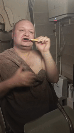 Morning teeth-brushing routine in a Bugry bathroom
