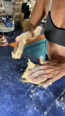 Homemade cinnamon rolls come together in a Venezuelan kitchen
