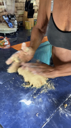 Homemade cinnamon rolls come together in a Venezuelan kitchen