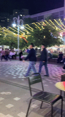 Nighttime scenes captured across central Almaty square and streets