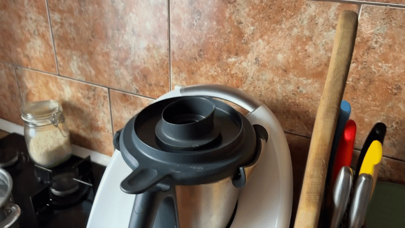 Person operates Thermomix food processor in Târgu Mureș kitchen