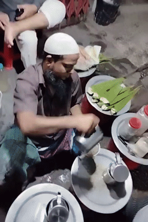 Street stall moment in Dhaka, Bangladesh