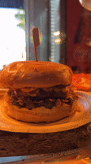 Morning meal documented at Sofia restaurant features burgers and pizza