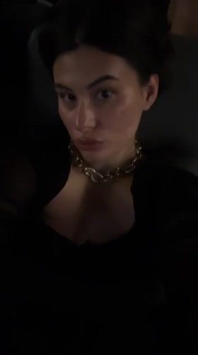 Woman takes selfies at movie theater in Kiryat Motzkin