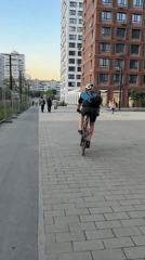 Woman and child share afternoon moments in Moscow development area