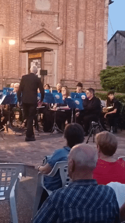 Brass band plays centenary concert at Dosolo's Piazza Castello
