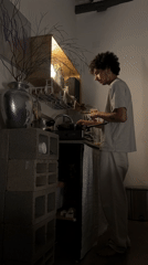 Tel Aviv resident cooks gnocchi dinner, dines while watching laptop