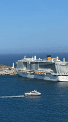 Tourists capture scenic Ibiza coastline views from historic fortifications