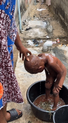 Traditional child bathing ritual observed in Badagry, Nigeria