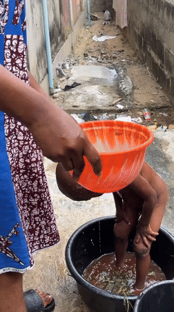 Traditional child bathing ritual observed in Badagry, Nigeria