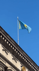 A calm Almaty morning: parks, pigeons, and Kazakh flags