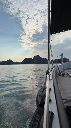 Families enjoy sunny beach day at Ha Long Bay