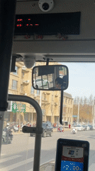 Bus passenger documents daily commute in Jin Zhou Shi