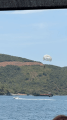 Tourist boat excursion with parasailing activity off Nha Trang coast