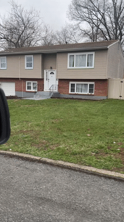 Pink car parks at suburban home in New Windsor