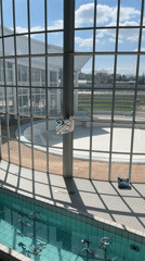 Indoor pool activity with aqua fitness equipment in France