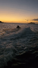 Sunset water activities captured near Búzios, Brazil