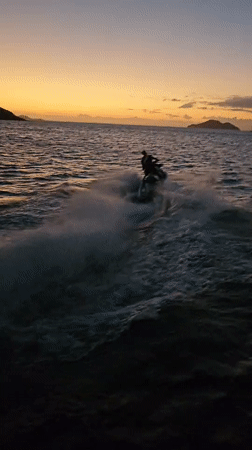 Sunset water activities captured near Búzios, Brazil