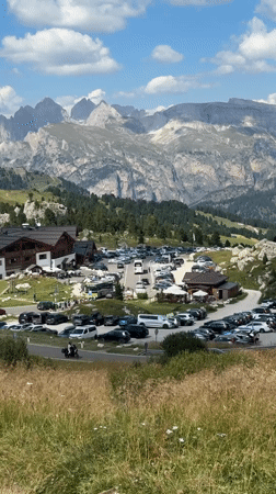 Packed parking lot signals peak summer crowds in Val Gardena