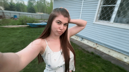 Woman films casual outdoor moments with pets in Мещёры
