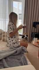 Lazy morning in Thailand with a dog and a warm drink