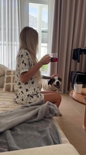 Lazy morning in Thailand with a dog and a warm drink