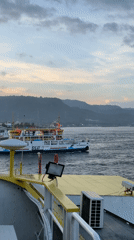 Ferry operations documented at Ketapang harbor during dawn hours