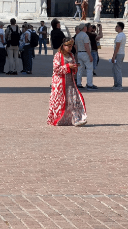 Traditional life continues at historic Samarkand madrasah plaza