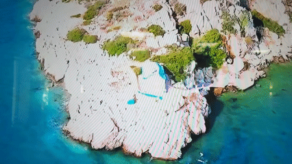 Drone footage captures tropical coastline scenes from Dnipro location