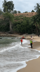 Early morning surf fishing scene captured at Thai beach