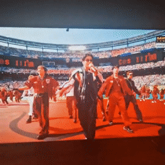 Stadium concert and soccer action across a Moscow summer evening