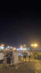 Summer evening on Nesebar's waterfront promenade and fairground