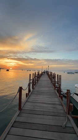 Sunset hour on Ko Samui's beachfront pier