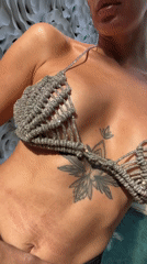 Woman photographed in silver bikini top in North Kuta