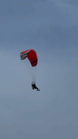 Powered paraglider spotted flying over Tel Aviv streets