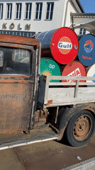 Vintage truck, city traffic documented in Cologne street scenes