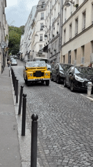 Tourist activities captured around Moulin Rouge district in Paris