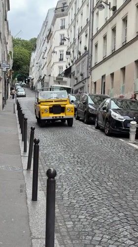 Tourist activities captured around Moulin Rouge district in Paris