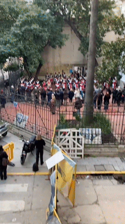 Ceremonial marching band in historic uniforms, Buenos Aires courtyard