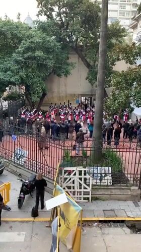 Ceremonial marching band in historic uniforms, Buenos Aires courtyard