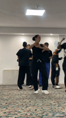 Dance crew rehearses lifts and choreography in Porlamar rehearsal space