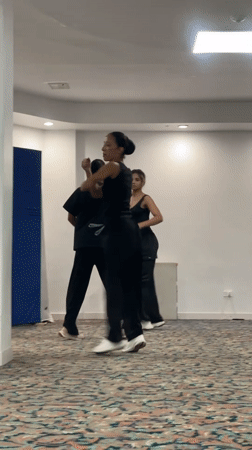 Dance crew rehearses lifts and choreography in Porlamar rehearsal space