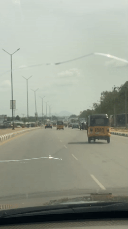 Ordinary street life documented across Nigerian towns during afternoon hours