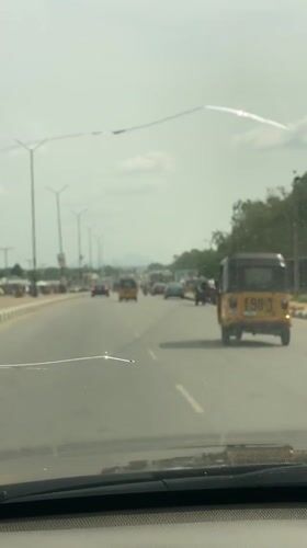 Ordinary street life documented across Nigerian towns during afternoon hours